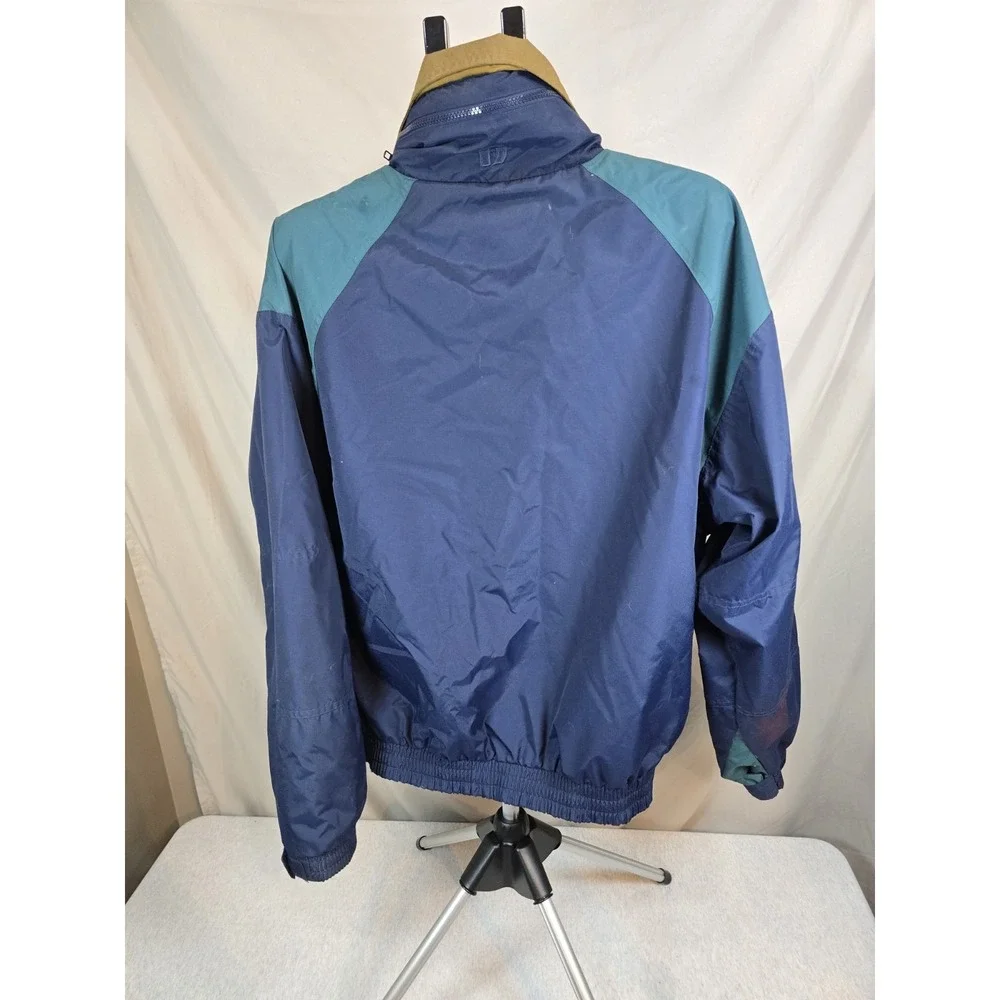 vintage 1996 AT&T Hriso nylon windbreaker jacket in a navy blue and teal...